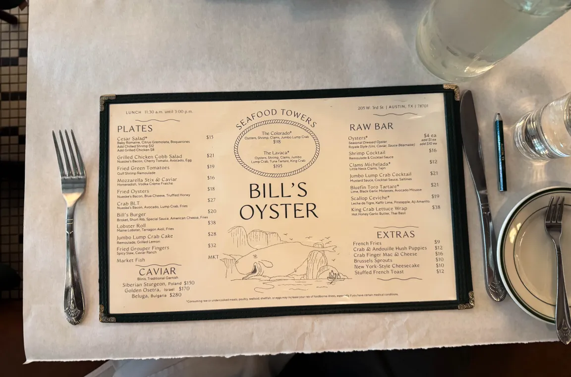 The menu for Bill's Oyster House, sitting on a table.