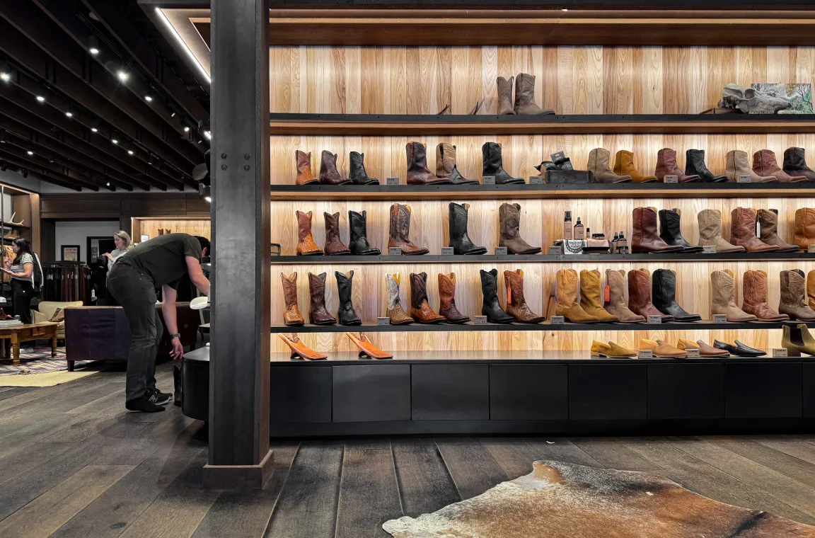 A store display filled with Western-style boots
